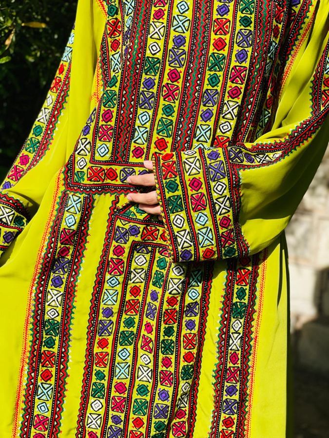 Lime green Balochi dress with multicolour embroidery